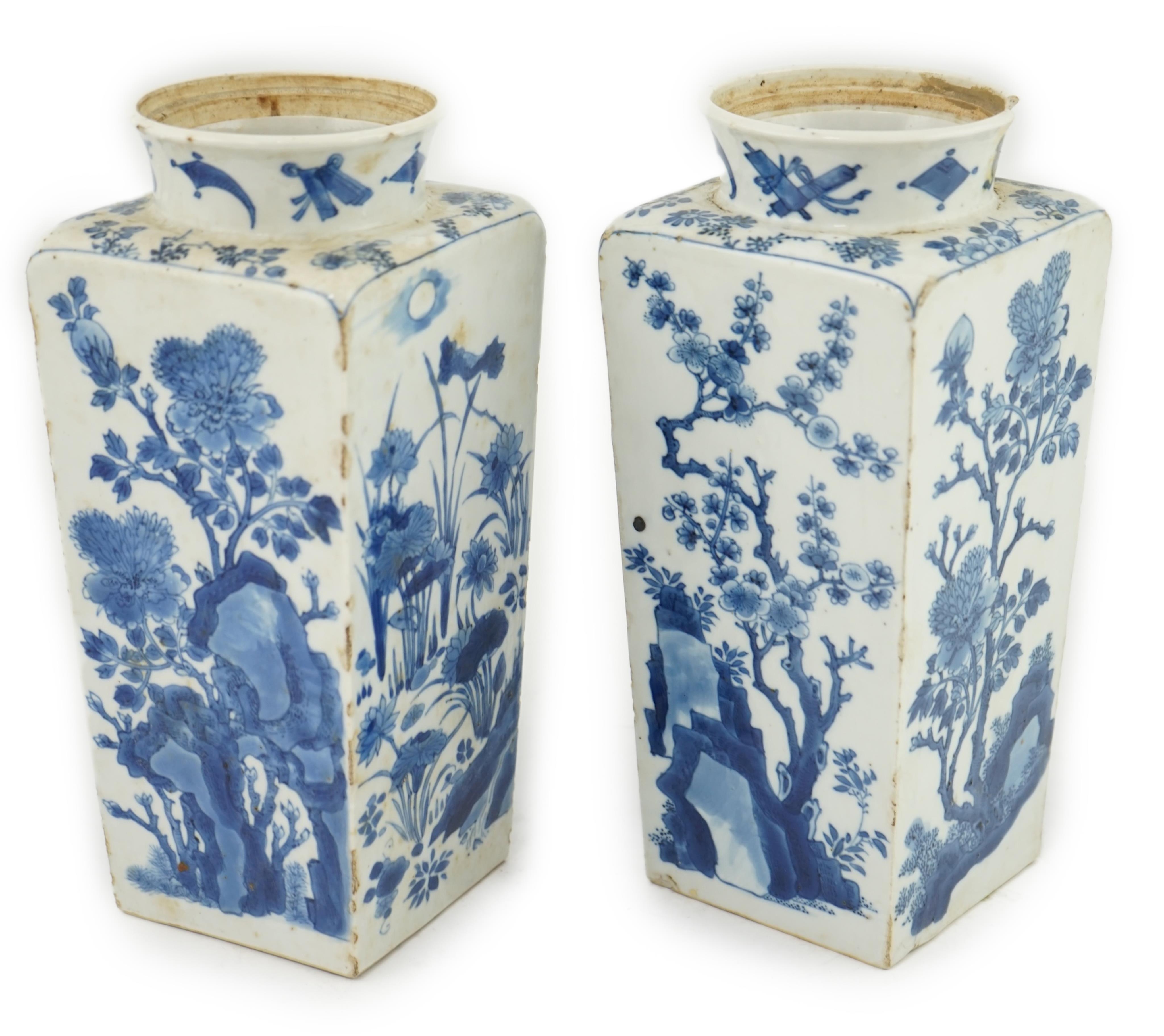 A pair of Chinese blue and white square section vases, Kangxi period